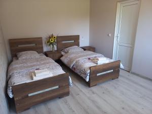 Voodi või voodid majutusasutuse Bee House toas
