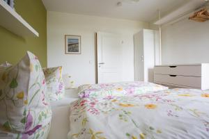 Letto o letti in una camera di Oland Whg 10 Südstrandperle