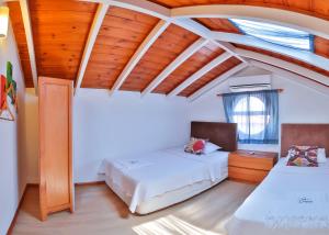 Cama o camas de una habitación en Çınarlar Apart Hotel KAŞ