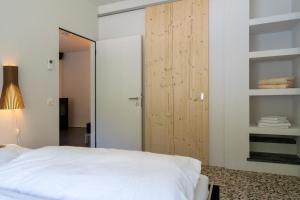 Postel nebo postele na pokoji v ubytování Villa Pineta