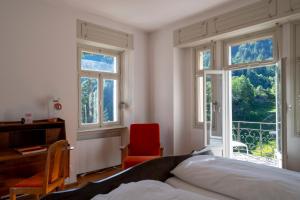 Postel nebo postele na pokoji v ubytování Villa Pineta