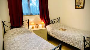 Postel nebo postele na pokoji v ubytování Bilini Garden Apartment