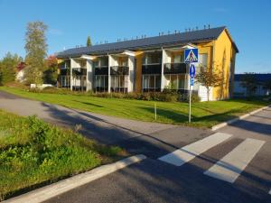 a building on the side of a road at J House in Jyväskylä