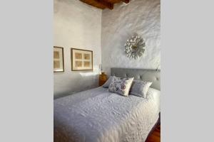 Llit o llits en una habitació de Casa Alegria II
