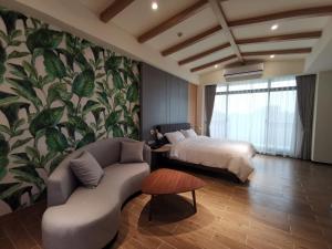 A bed or beds in a room at Meets Anping