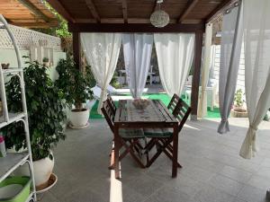 Kép Casa vacanza Ferrara IUN P5547 szállásáról Villasimiusban a galériában