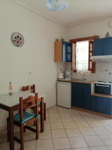 Kuchyň nebo kuchyňský kout v ubytování Tiki Rooms + 37 fotografií