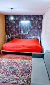 Una cama o camas en una habitación de White Shino Hostel