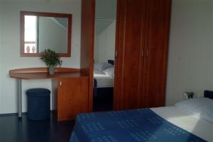 Posteľ alebo postele v izbe v ubytovaní Apartments Villa Novak