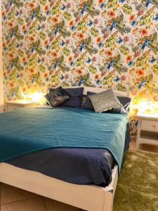 Un pat sau paturi într-o cameră la The Loft E&E Open Space
