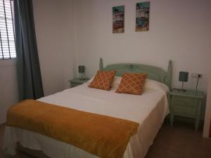 En eller flere senge i et værelse på Villa Teresitas, Casa Grande en Gran Alacant