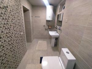 A bathroom at Comfortable Home Stay