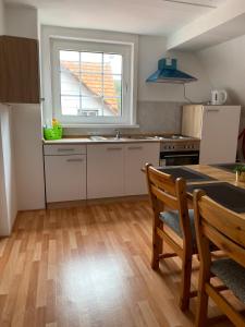 Kuchyň nebo kuchyňský kout v ubytování Über den Dächern von Hann Münden + 9 fotografií