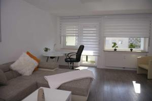 Posezení v ubytování Helle, Ruhige, Moderne Wohnung, 5 min zu Fa GROB