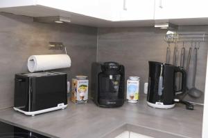Kuchyň nebo kuchyňský kout v ubytování Helle, Ruhige, Moderne Wohnung, 5 min zu Fa GROB