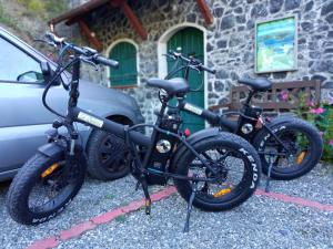 two bikes are parked in front of a house at Agriturismo La Quiete in Levanto