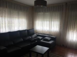 A seating area at A CASA DE TOXO