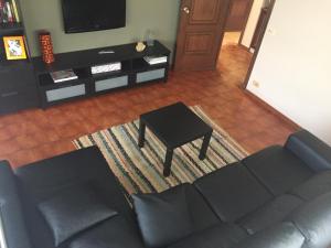 A seating area at A CASA DE TOXO