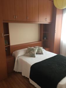 A bed or beds in a room at A CASA DE TOXO