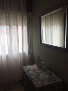 A bed or beds in a room at A CASA DE TOXO