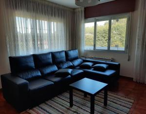 A seating area at A CASA DE TOXO