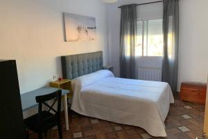 Postel nebo postele na pokoji v ubytování Casa rural Gómez de Hita + 9 fotografií
