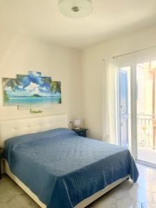 Posteľ alebo postele v izbe v ubytovaní La palma rooms & apartments