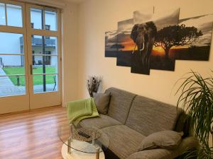 Ein Sitzbereich in der Unterkunft Downtown Apartments Leipzig