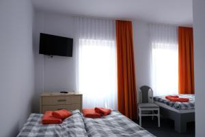 Posteľ alebo postele v izbe v ubytovaní Willa Świetlana