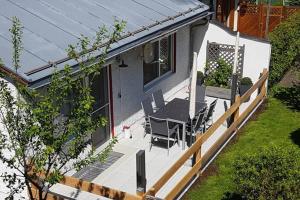 an overhead view of a porch with a table and chairs at Ferienhaus Gabriela Allgäu in Immenstadt im Allgäu