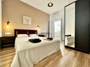 A bed or beds in a room at B&B Boutique Two Bedrooms Apartments