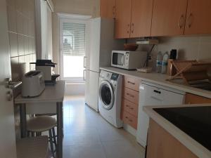 A cozinha ou kitchenette de Altavista Penthouse T2