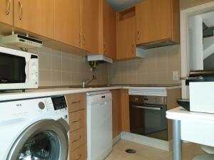 A cozinha ou kitchenette de Altavista Penthouse T2
