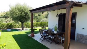 A garden outside Villa NOVE - Residence dei Fiori