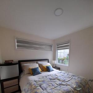 Postel nebo postele na pokoji v ubytování habitac privada Bed n Bkf Patagonia Norte - Puerto Varas Homestay - BnB Plus