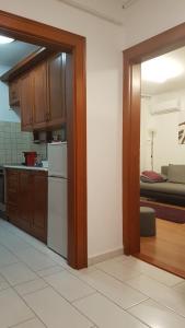 Kuchyňa alebo kuchynka v ubytovaní ROSE Apartman