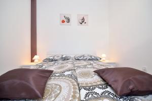 Postel nebo postele na pokoji v ubytování Apartments Nautilus
