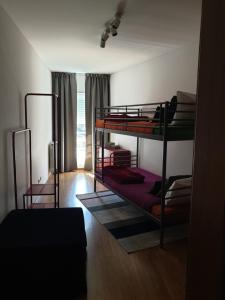 Uma cama ou camas num quarto em Altavista Penthouse T2