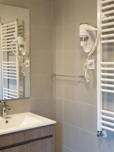 Uma casa de banho em Altavista Penthouse T2