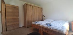 Postel nebo postele na pokoji v ubytování Apartmány Adieu