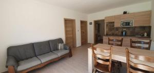 Kuchyň nebo kuchyňský kout v ubytování Apartmány Adieu