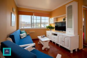 A television and/or entertainment centre at Inés Apartment, Montaña La Data