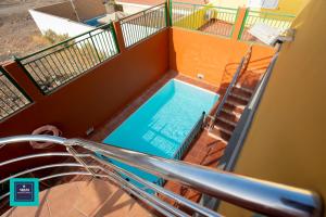 The swimming pool at or close to Inés Apartment, Montaña La Data