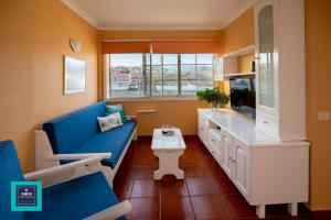 A television and/or entertainment centre at Inés Apartment, Montaña La Data