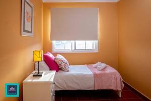 A bed or beds in a room at Inés Apartment, Montaña La Data