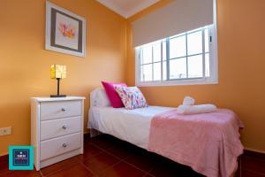 A bed or beds in a room at Inés Apartment, Montaña La Data