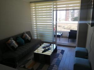 Posedenie v ubytovaní Edificio Medano Con Con