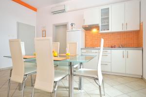 Kuchyň nebo kuchyňský kout v ubytování Apartments Nautilus