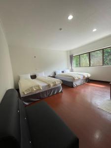 Postel nebo postele na pokoji v ubytování Dong Bi Villa