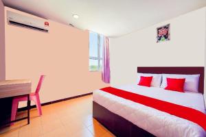 Postel nebo postele na pokoji v ubytování CMN Hotel & Homestay